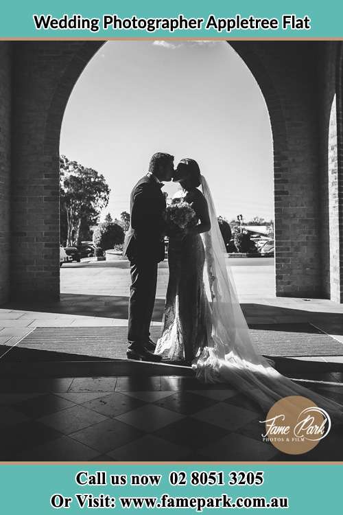 Photo of the Groom and the Bride kissing Appletree Flat NSW 2330