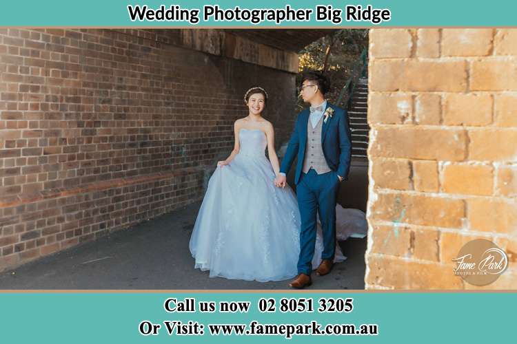 Photo of the Bride and the Groom walking Big Ridge NSW 2330