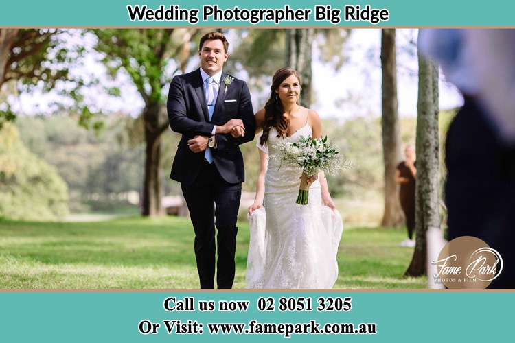 Photo of the Groom and the Bride walking Big Ridge NSW 2330