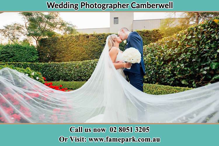 Photo of the Bride and the Groom kissing at the garden Camberwell NSW 2330