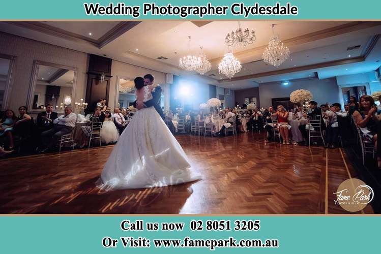 Photo of the Bride and the Groom hugging on the dance floor Clydesdale NSW 2330