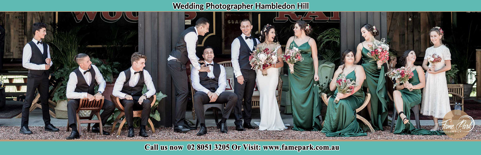 The Bride and the Groom with their entourage pose for the camera Hambledon Hill NSW 2330