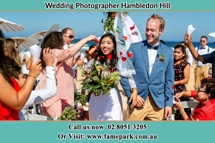 Photo of the Bride and the Groom showering flower petal by the visitors Hambledon Hill NSW 2330