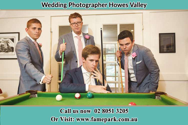 Photo of the Groom and the groomsmen playing billiard Howes Valley NSW 2330