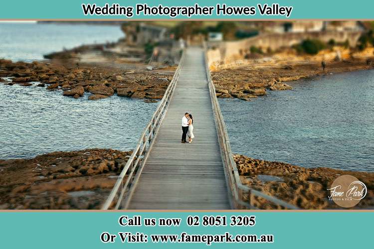 Photo of the Groom and the Bride at the bridge Howes Valley NSW 2330