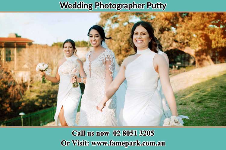 Photo of the Bride and the bridesmaids walking Putty NSW 2330