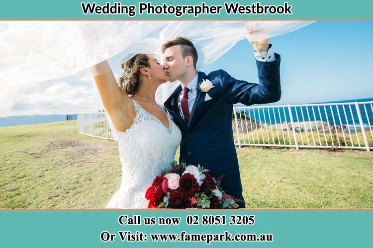 Photo of the Bride and the Groom kissing at the yard Westbrook NSW 2330